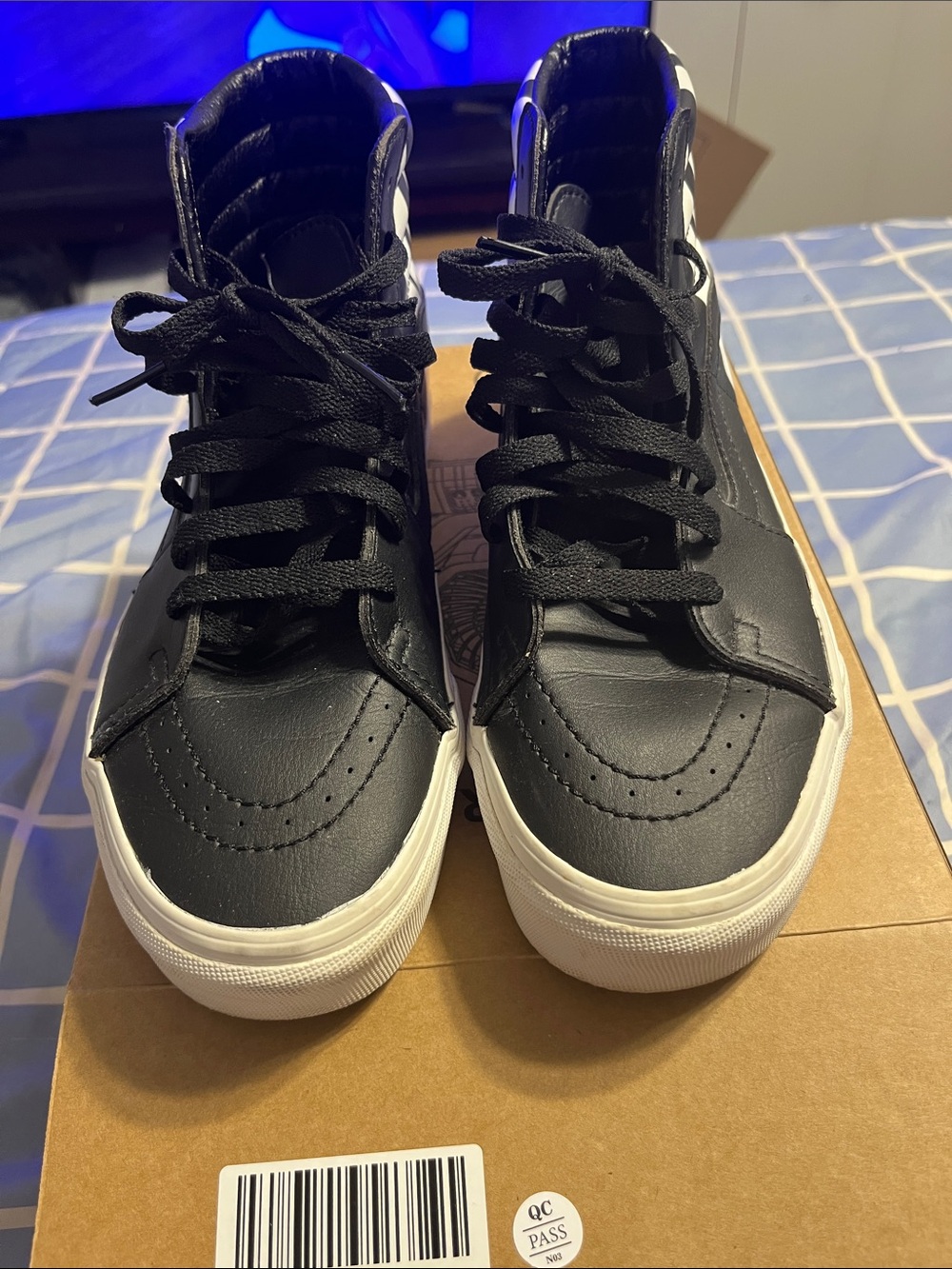 Vans Black and White High-Top Skate Sneakers